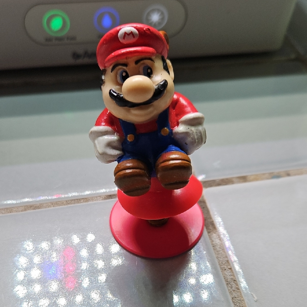 1989 Nintendo Red and Blue Racoon Mario